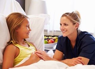 Nurse having a conversation with the child - Home Health in Chadds Ford, PA