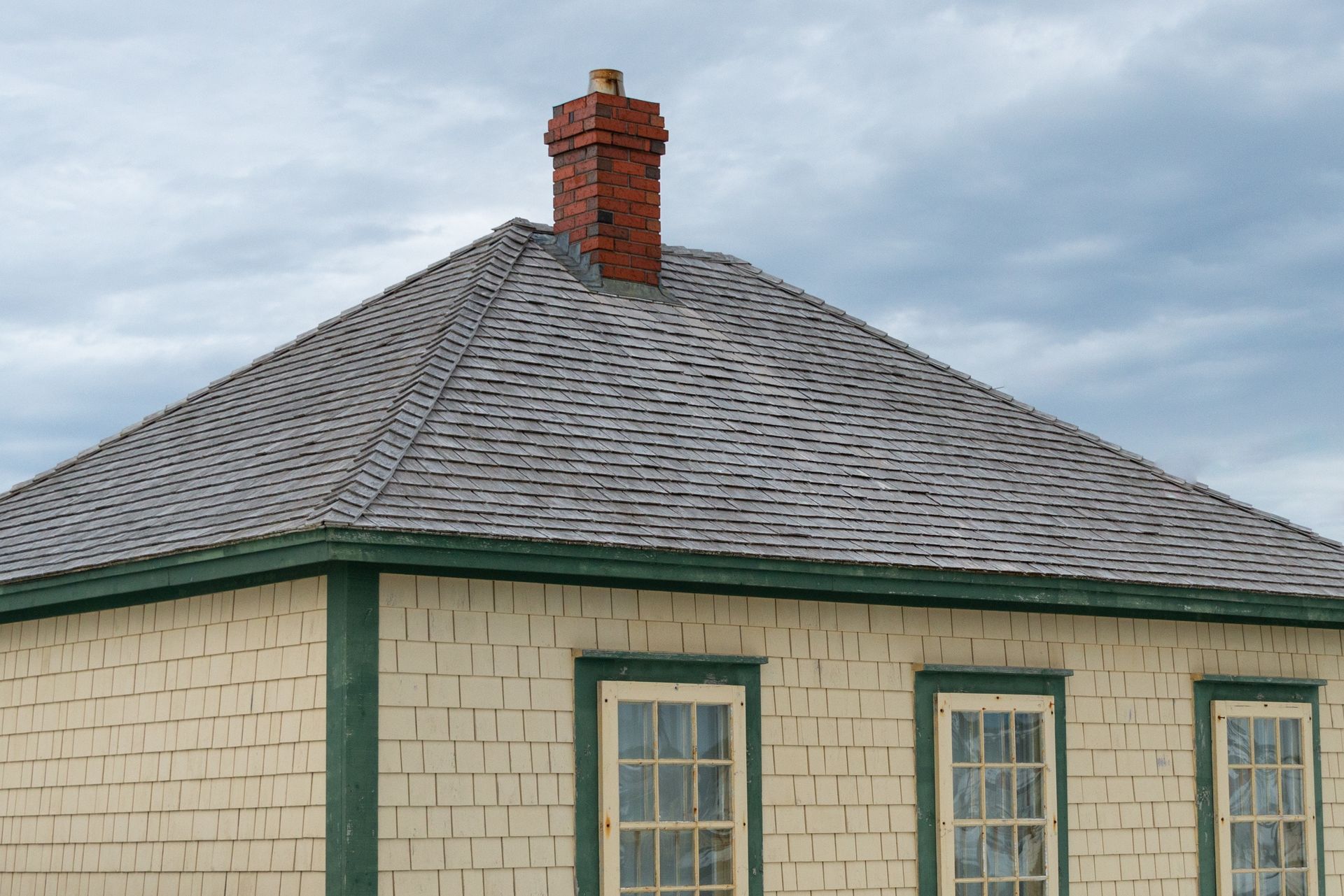 A house with a chimney on top of it