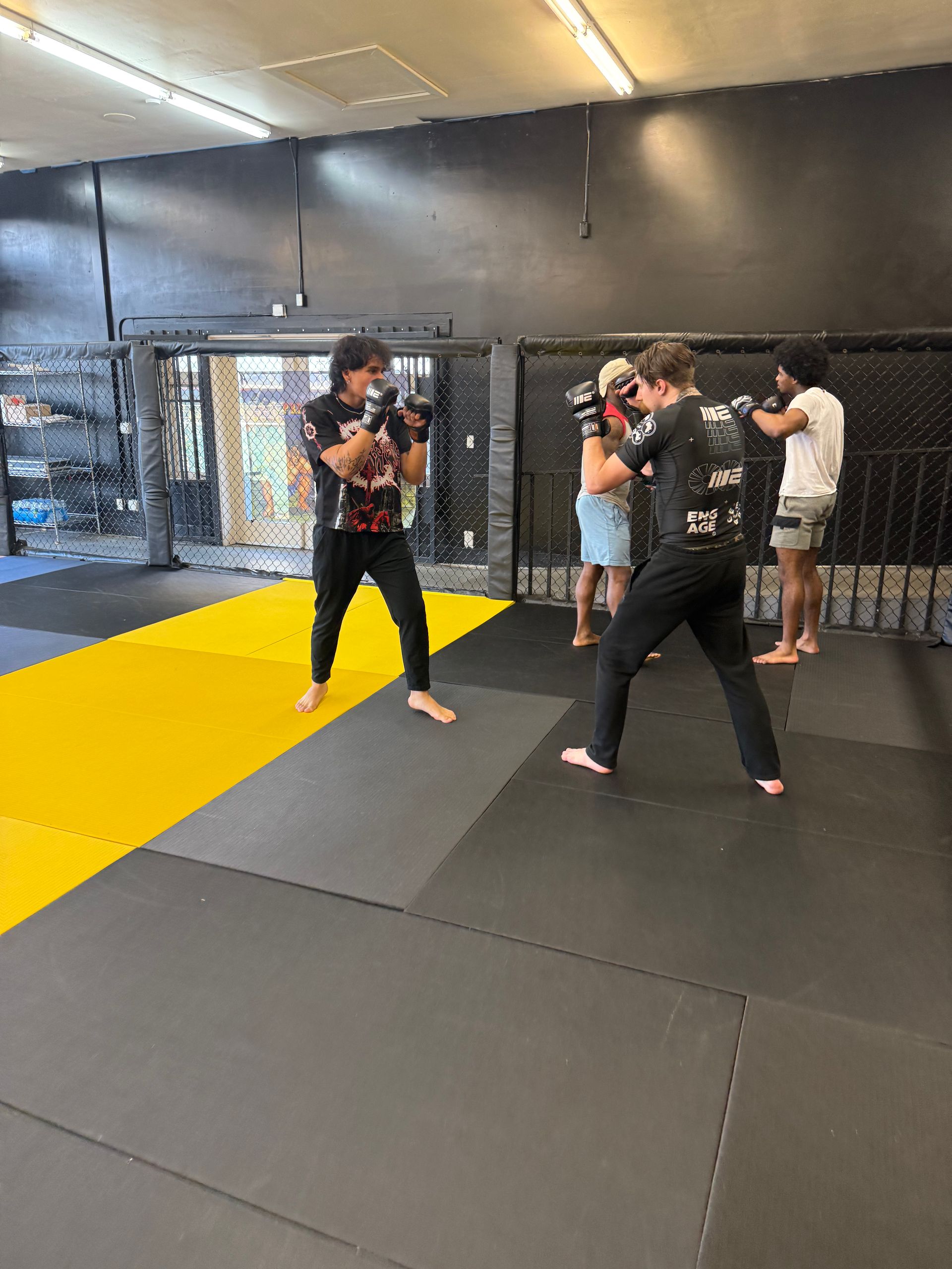 Partners practice controlled Jiu-Jitsu drills at Mythic Martial Arts in Tacoma, WA.