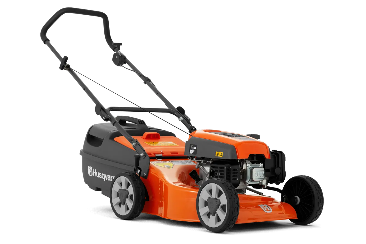 Orange and Black Husqvarna Lawnmower With a Black Handle — M.M & Mechanical in Dubbo, NSW