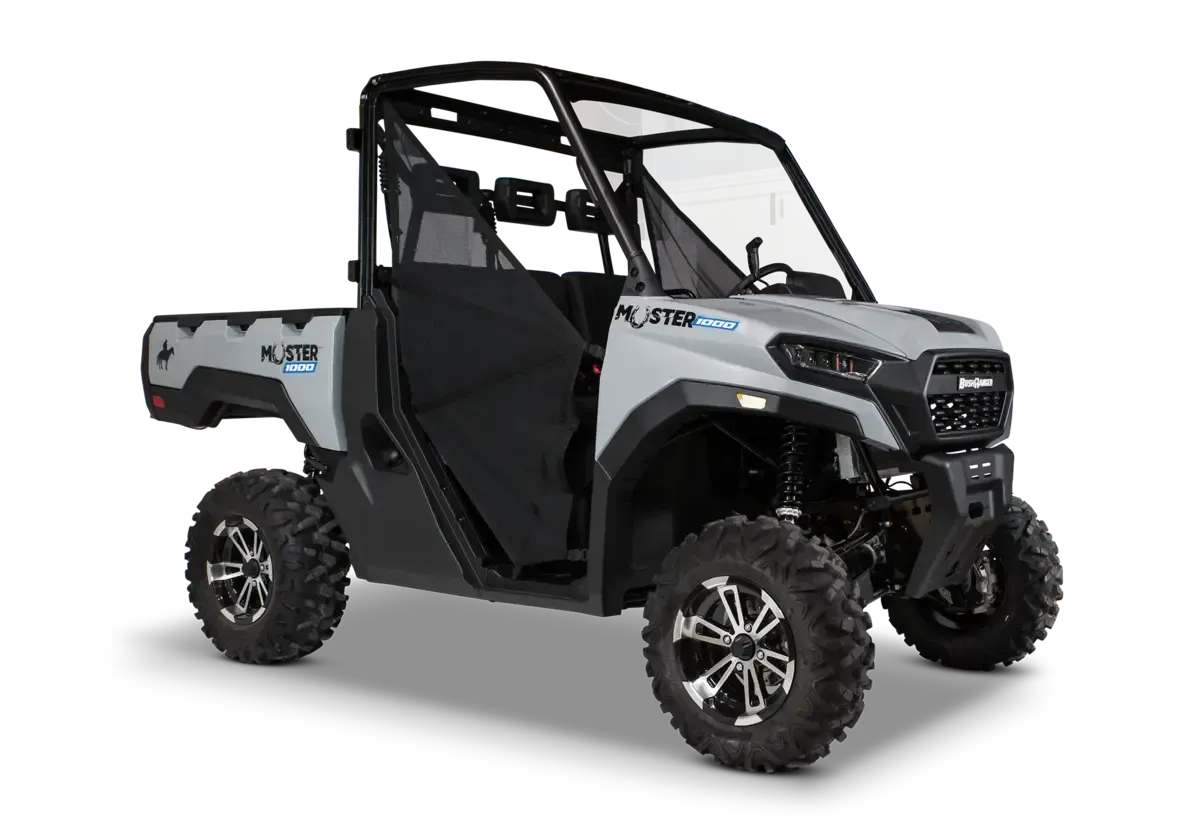 Red and Black Side-by-side Atv With Open Bed, Parked on Gravel — M.M & Mechanical in Dubbo, NSW