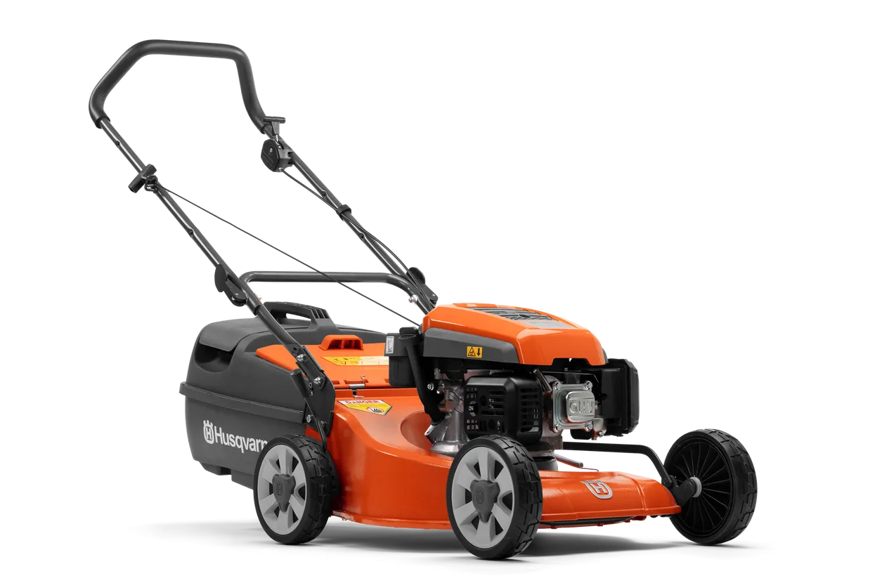 Orange and Black Husqvarna Lawn Mower With Raised Handles — M.M & Mechanical in Dubbo, NSW