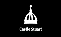 A white castle stuart logo on a black background