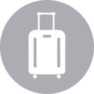 An icon of a suitcase in a circle on a white background.