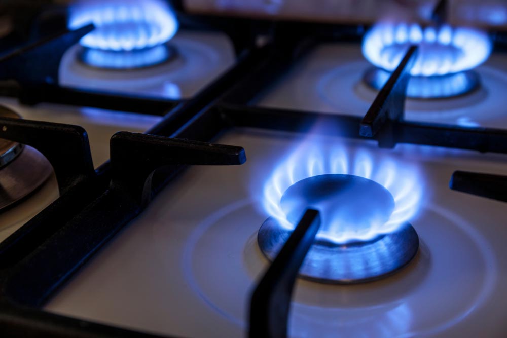 Close Up Image Of Blue Flames Of A Gas Burners — Mainline Plumbing & Civil Pty Ltd In Dubbo, NSW