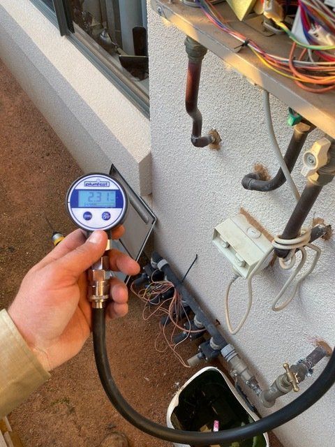 Our Gas Fitter Testing Gas Lines On A Dubbo Property — Mainline Plumbing & Civil Pty Ltd In Dubbo, NSW