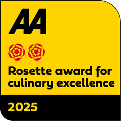 A yellow sign that says aa rosette award for culinary excellence 2025