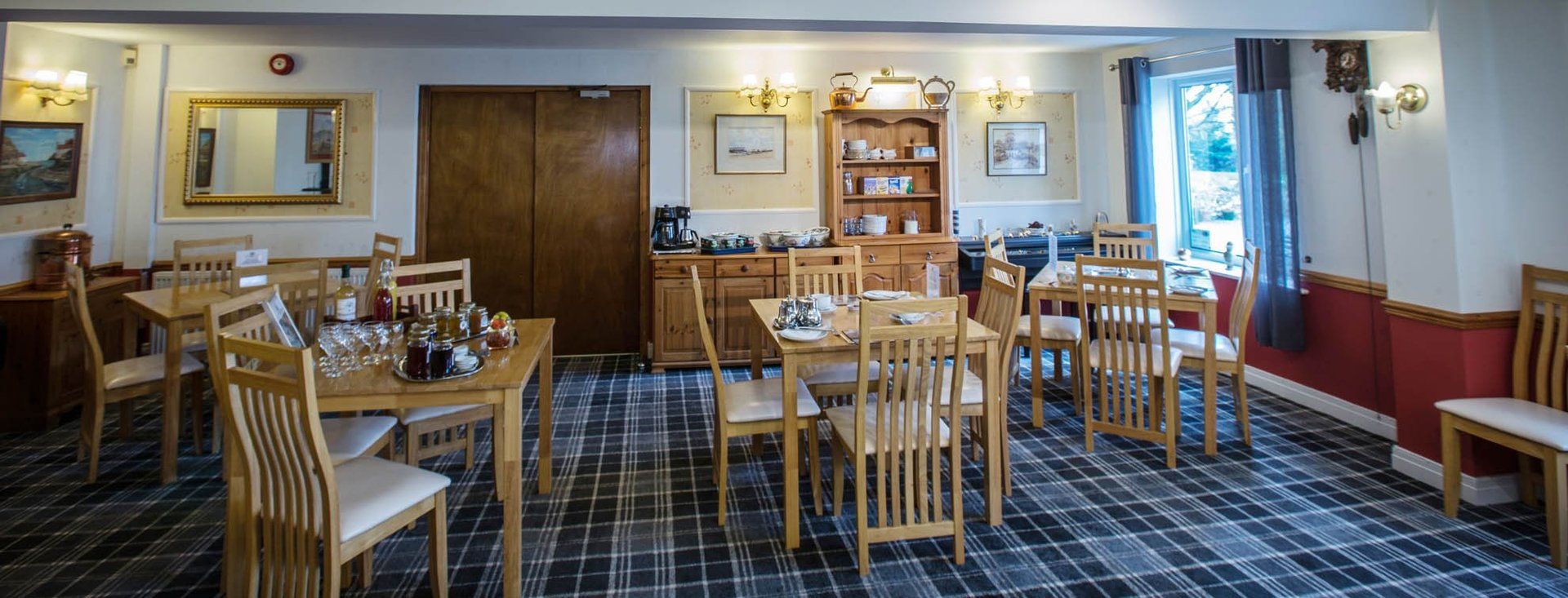 A large dining room filled with tables and chairs.