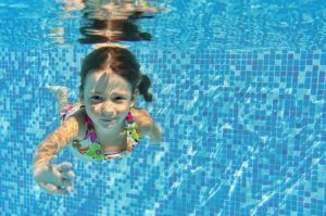 Young Girl Underwater — Lisle, IL – Jim Dhamer Plumbing and Sewer, Inc.