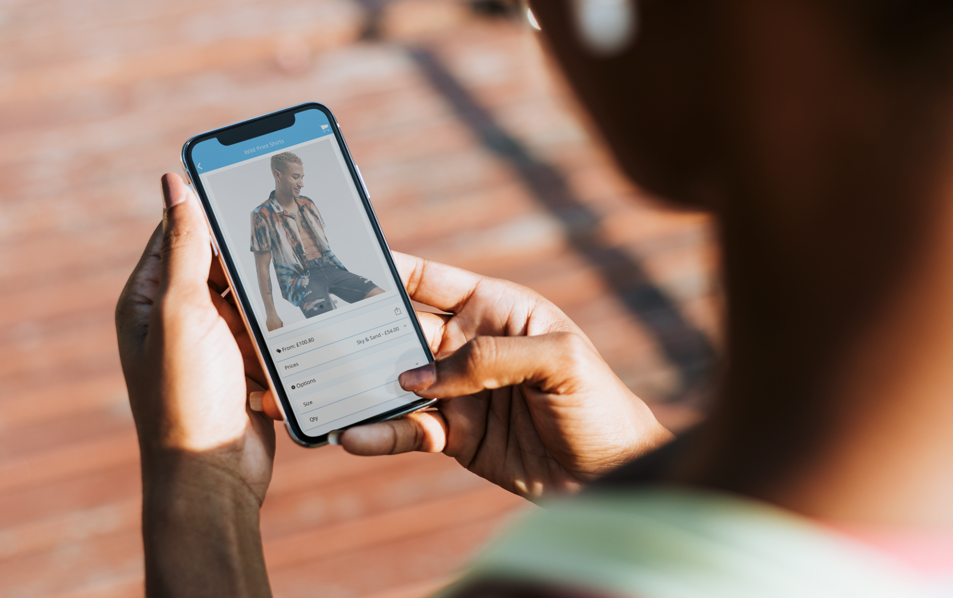 Person using a smartphone, viewing a profile photo.