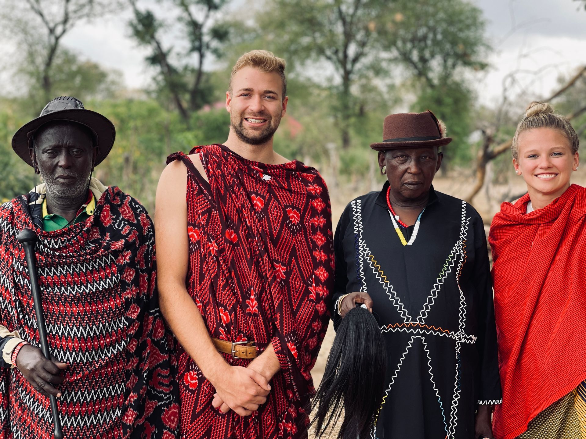 A group of people are posing for a picture together.