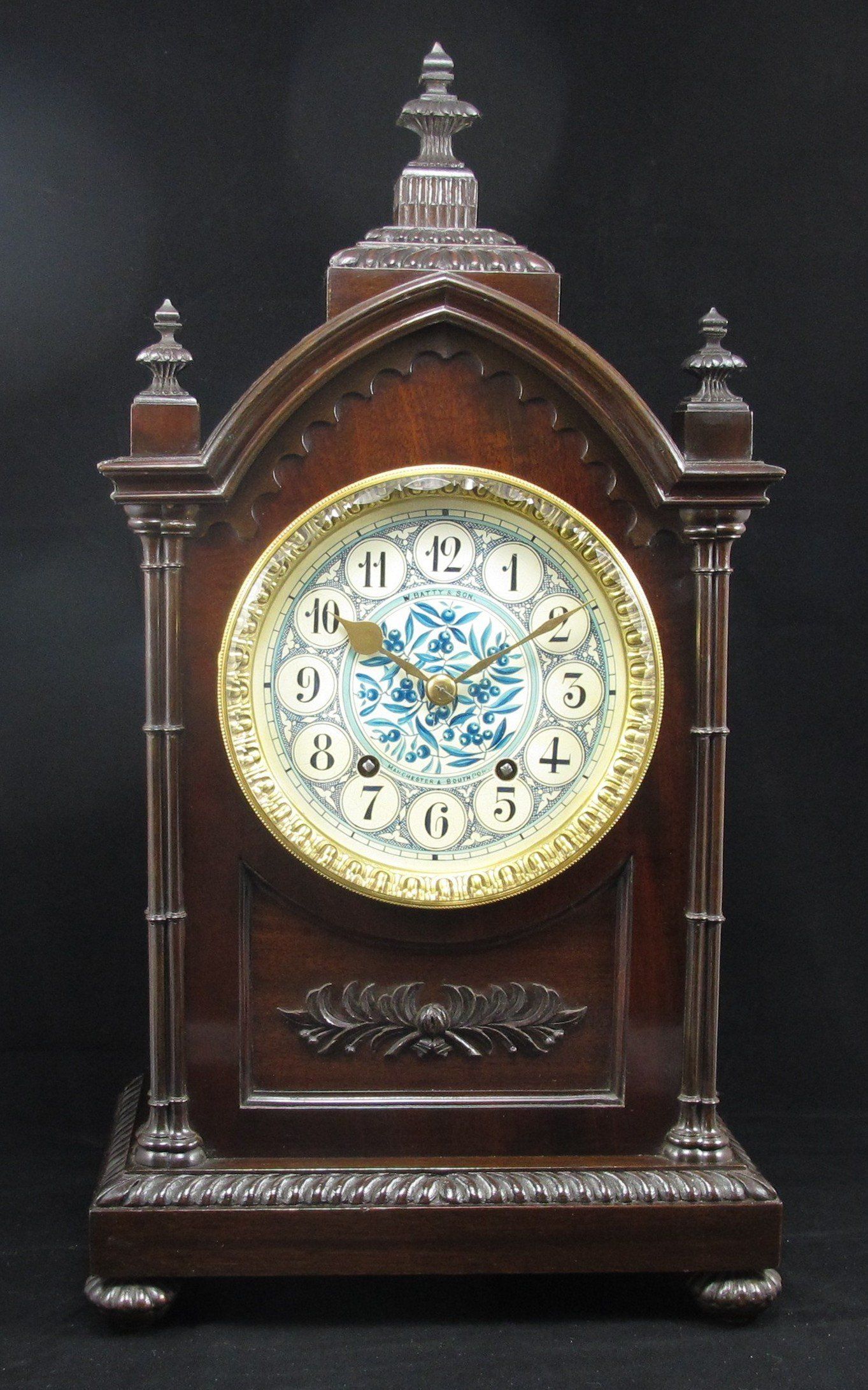 Gothic style, mahogany lancet clock case.