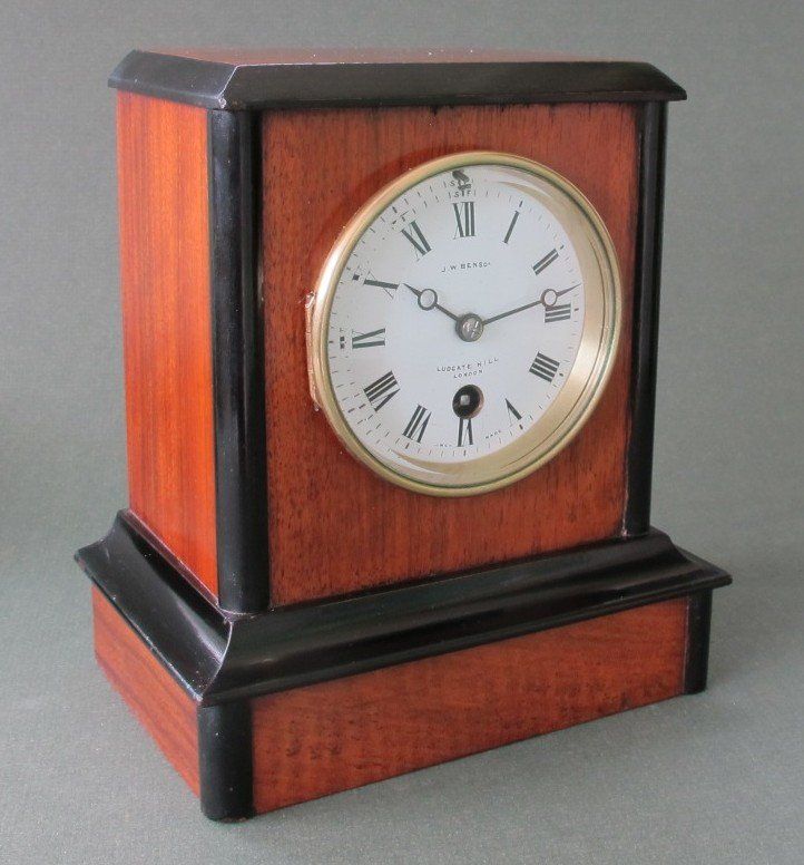 Walnut and Ebonised Case Mantel Clock retailed by J W Benson