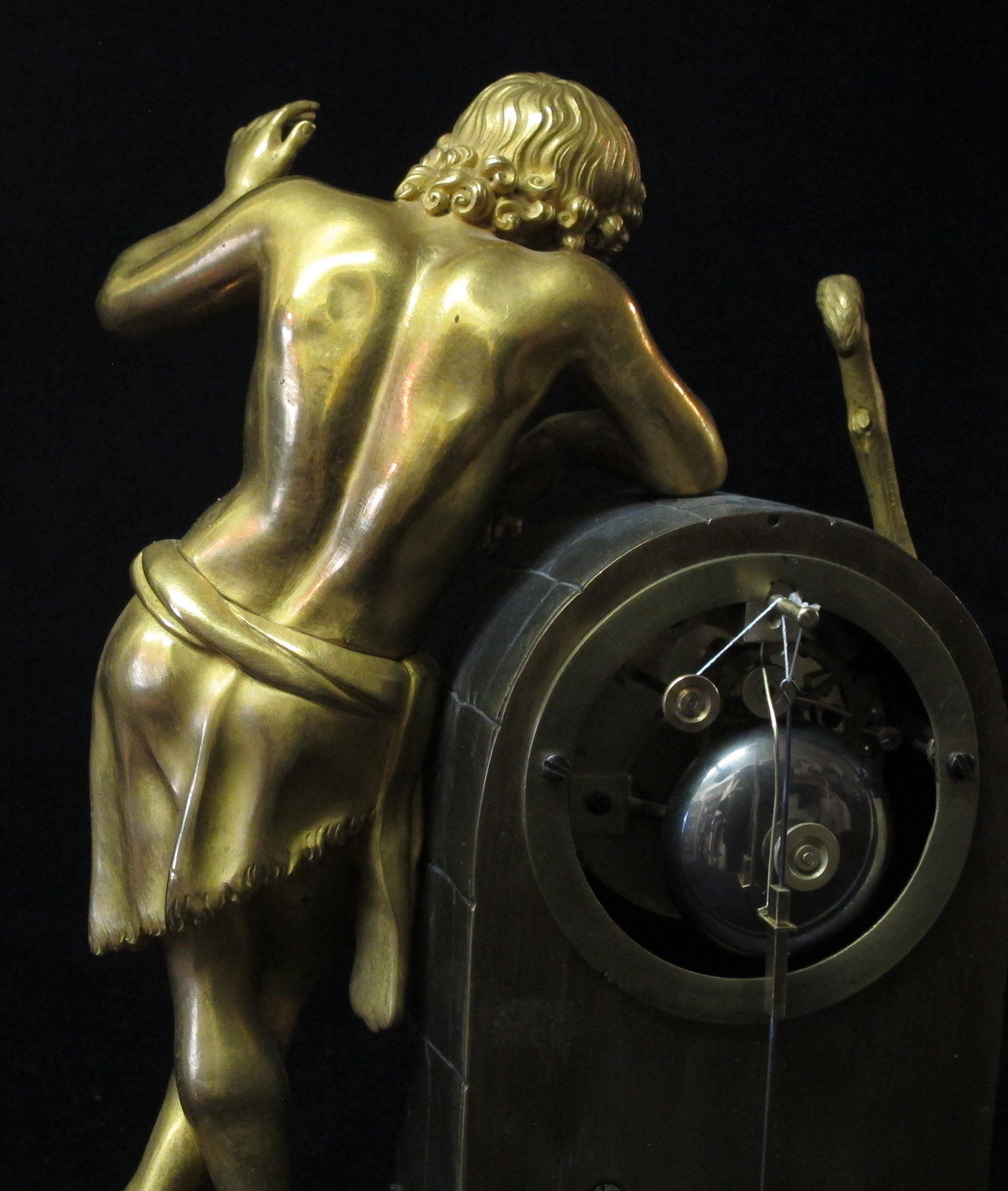 Rear view of gilt youth