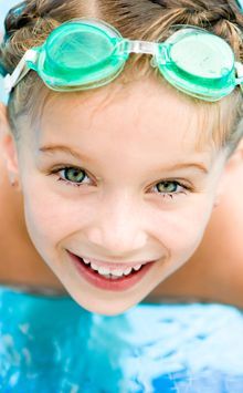 Close up of smiling boy with blue eyes
