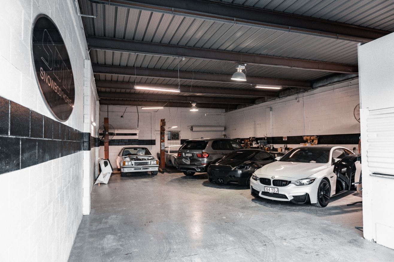 Row of Cars in Workshop — Panel Beaters in Southport, QLD