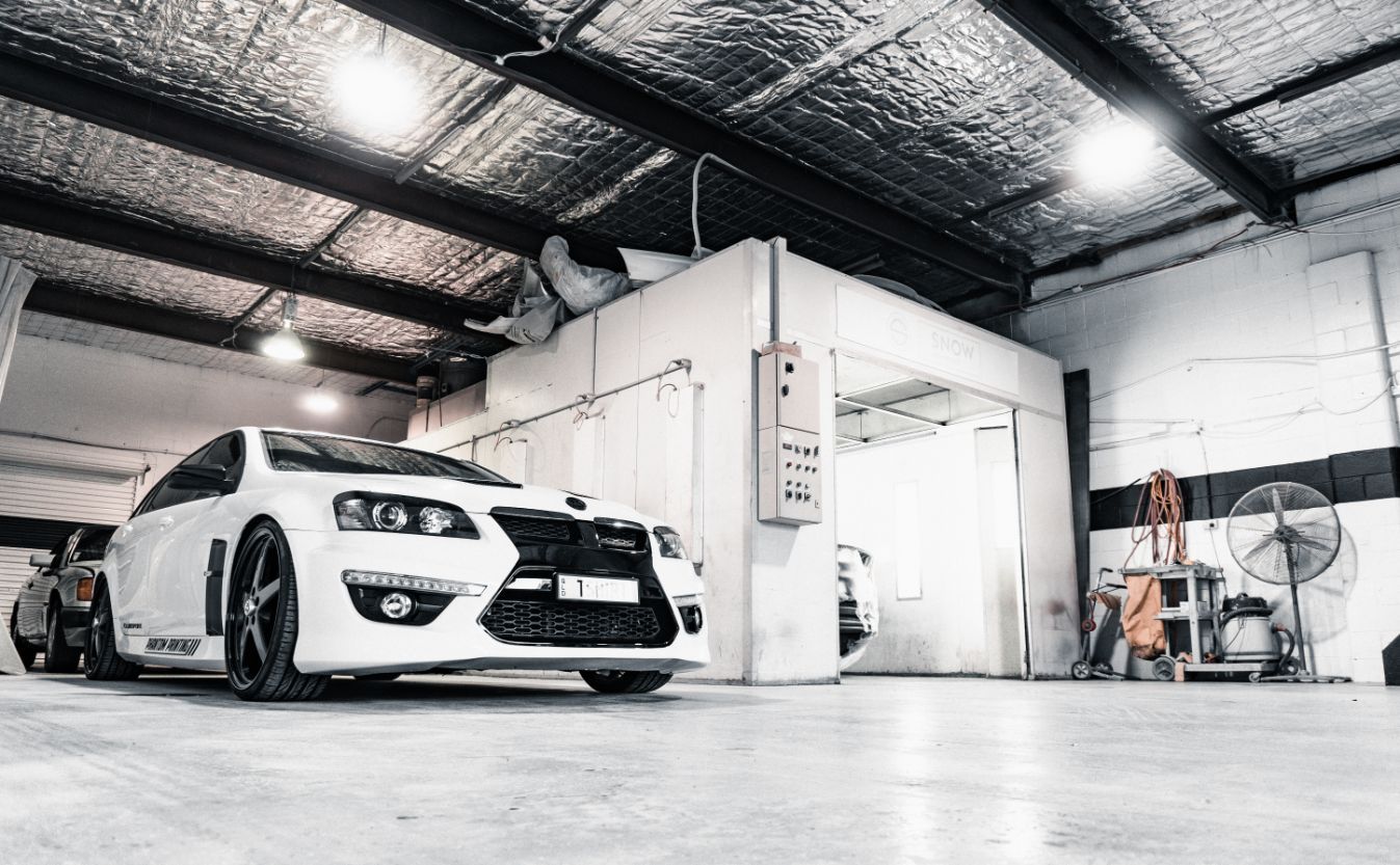 White BMW Car Inside Workshop — Panel Beaters in Southport, QLD