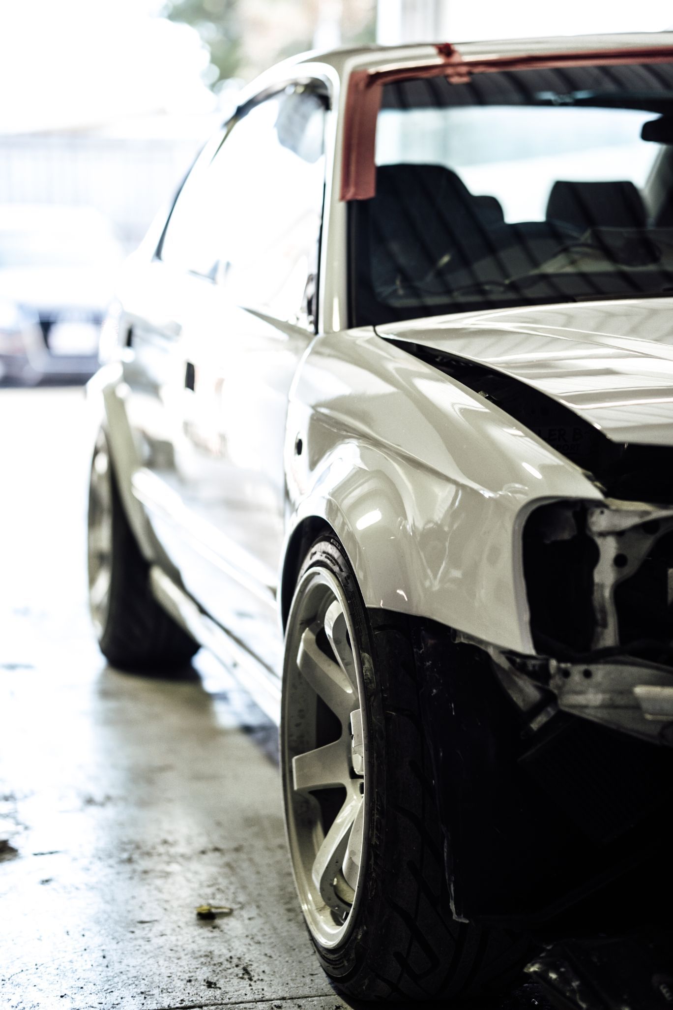 Side View Of White Car — Panel Beaters in Southport, QLD