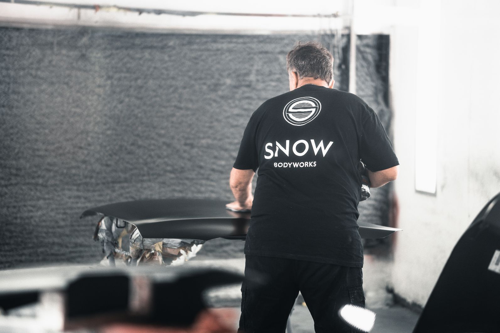 Man Working on Car Bonnet — Panel Beaters in Southport, QLD