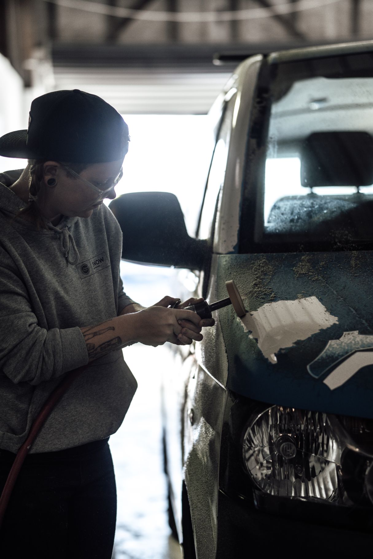 Grinding The Side Of The Car — Panel Beaters in Southport, QLD