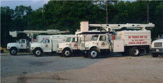 Four White Trucks — Marietta, GA — Ace Tree Surgery Inc.