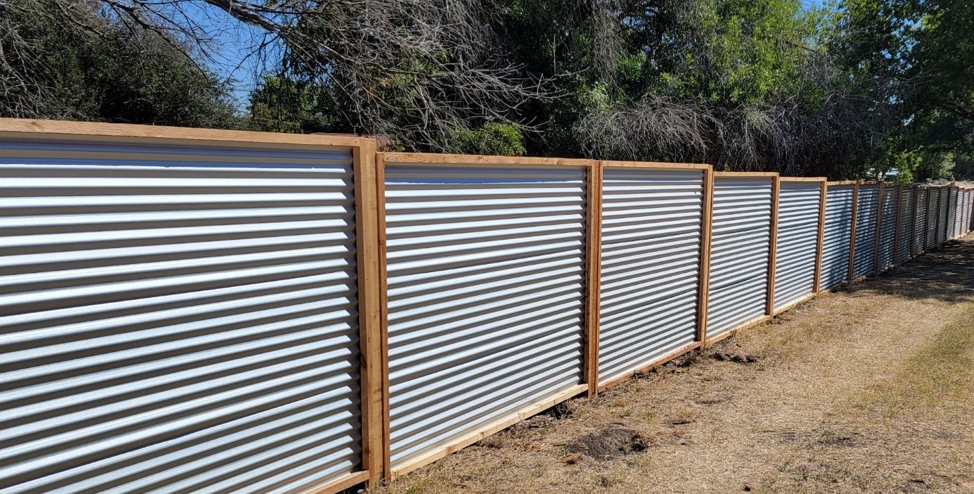 Pflugerville Pfence Company fencing, wrought iron, gates, decks, and patio installation in Central Texas and Austin.