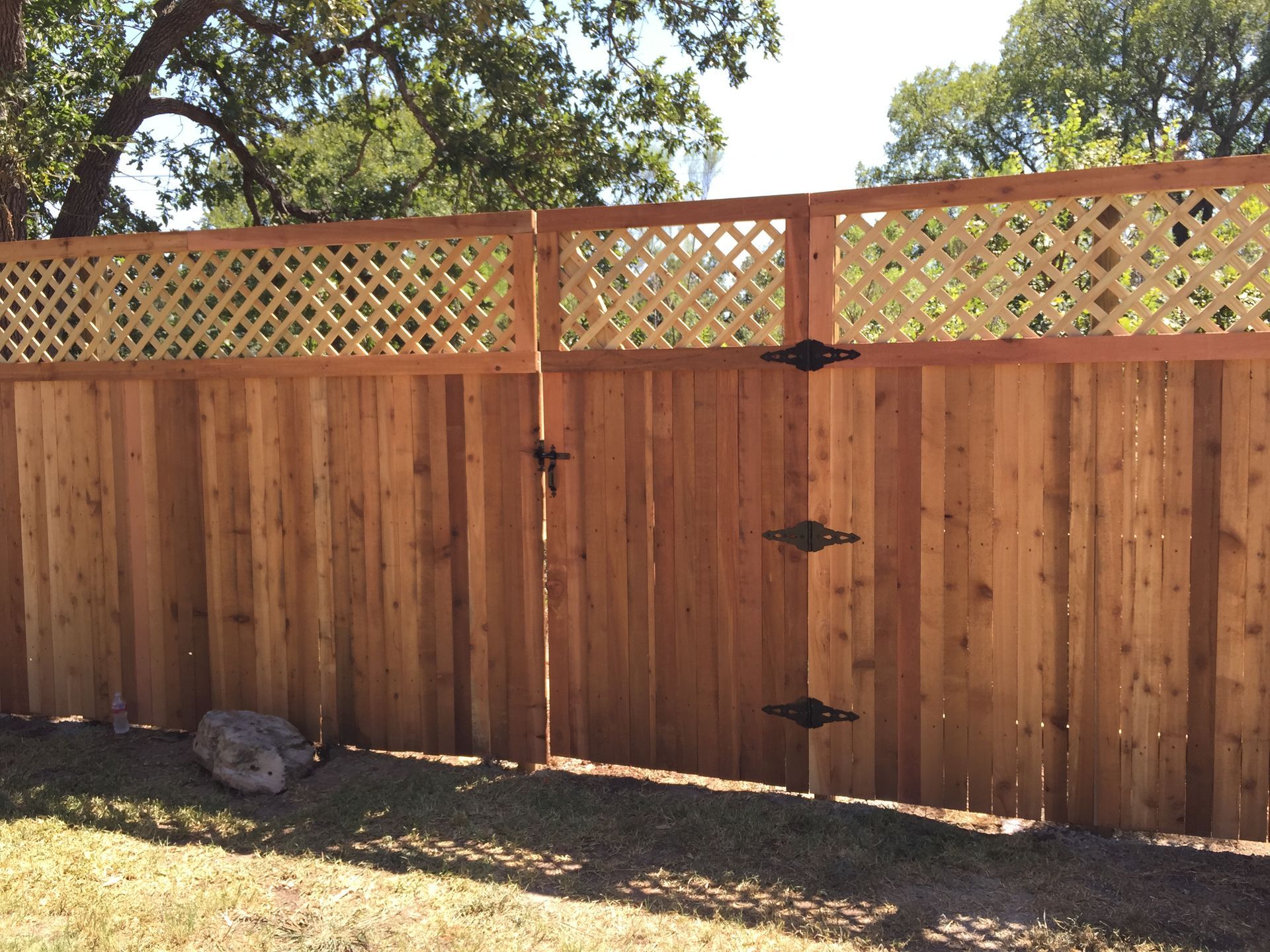 Pflugerville Pfence Company fencing, wrought iron, gates, decks, and patio installation in Central Texas and Austin.