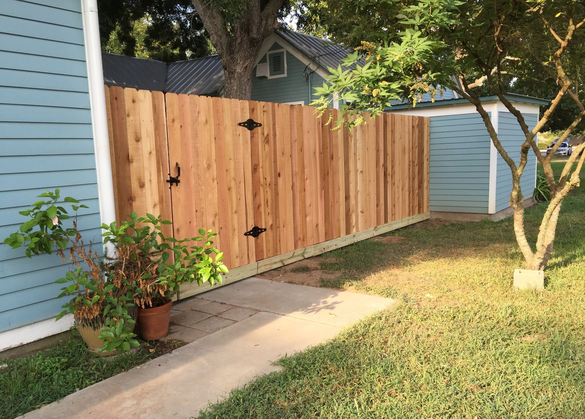 Pflugerville Pfence Company fencing, wrought iron, gates, decks, and patio installation in Central Texas and Austin.