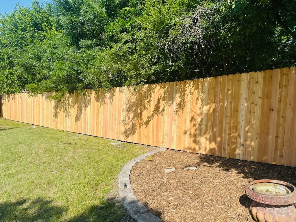 Pflugerville Pfence Company fencing, wrought iron, gates, decks, and patio installation in Central Texas and Austin.