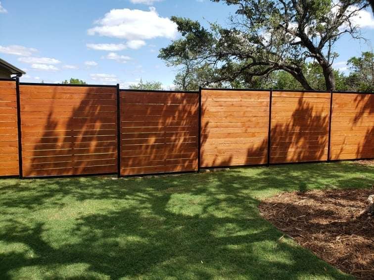 Pflugerville Pfence Company fencing, wrought iron, gates, decks, and patio installation in Central Texas and Austin.