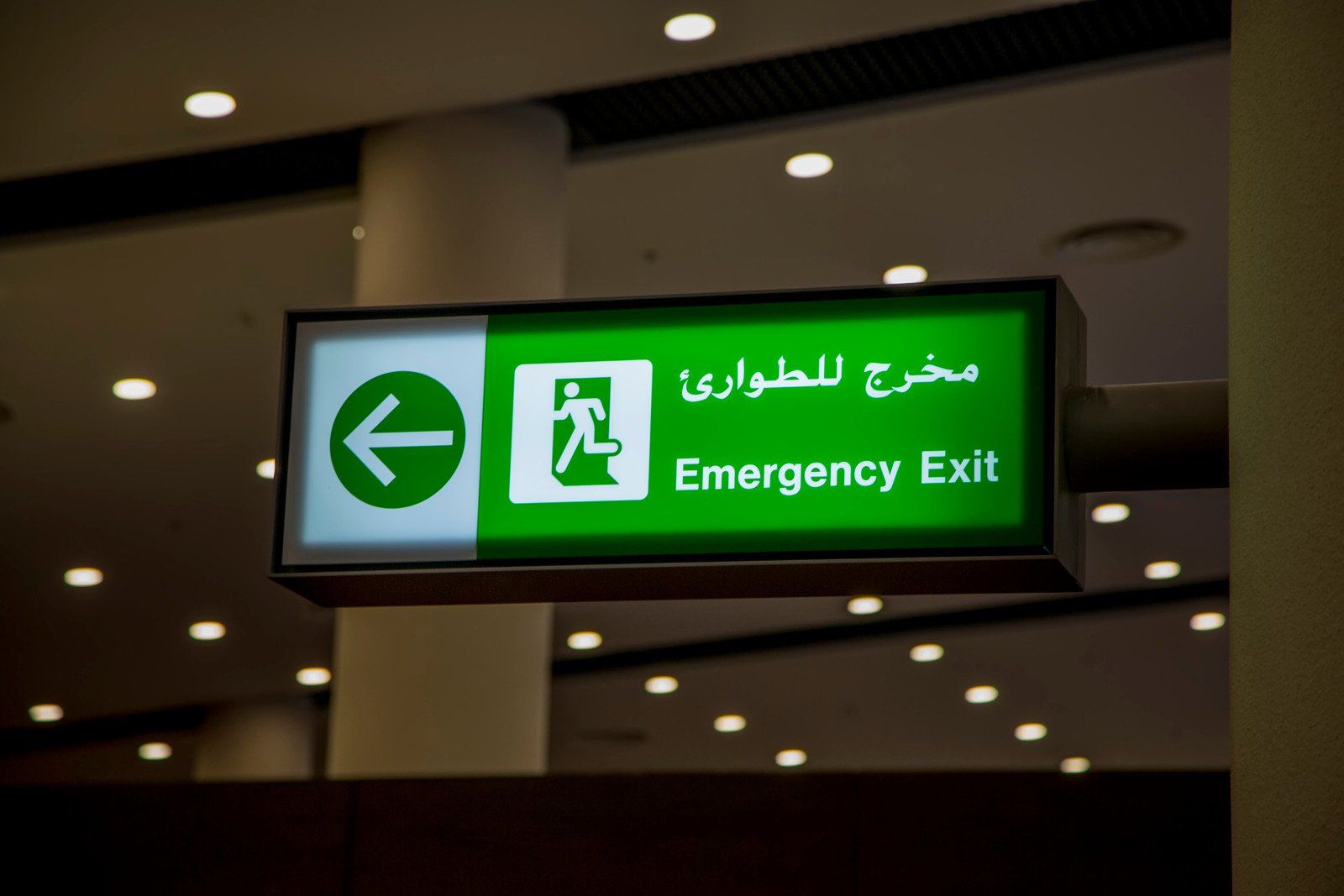 A wooden fence is sitting in the middle of a grassy field.