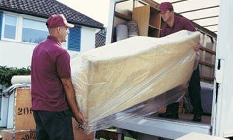 Movers Unloading Furniture — Moving in Shelbyville, TN