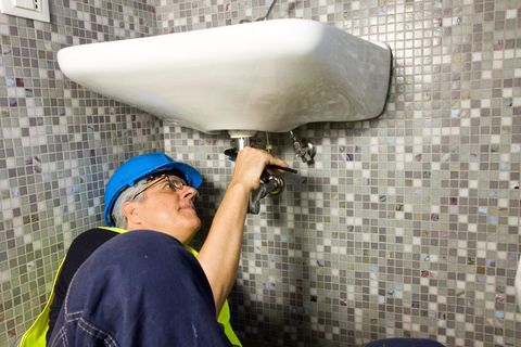 Plumbing Services Cockeysville, MD — Plumbing Expert Repairing A Tub in Jarrettsville, MD
