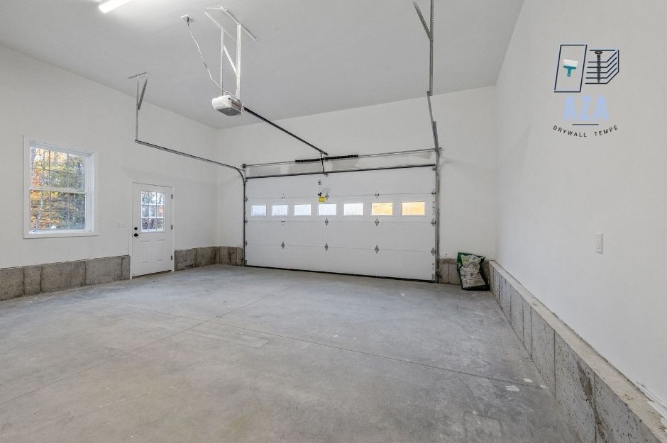 Newly installed drywall for a large garage sheetrock project in Tempe.