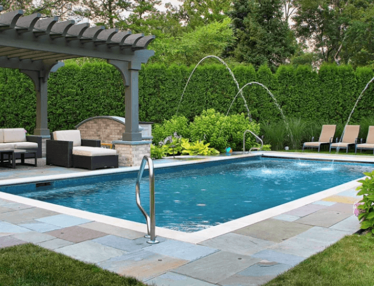 Concrete company pours stamped concrete design for a pool deck in chicago, IL