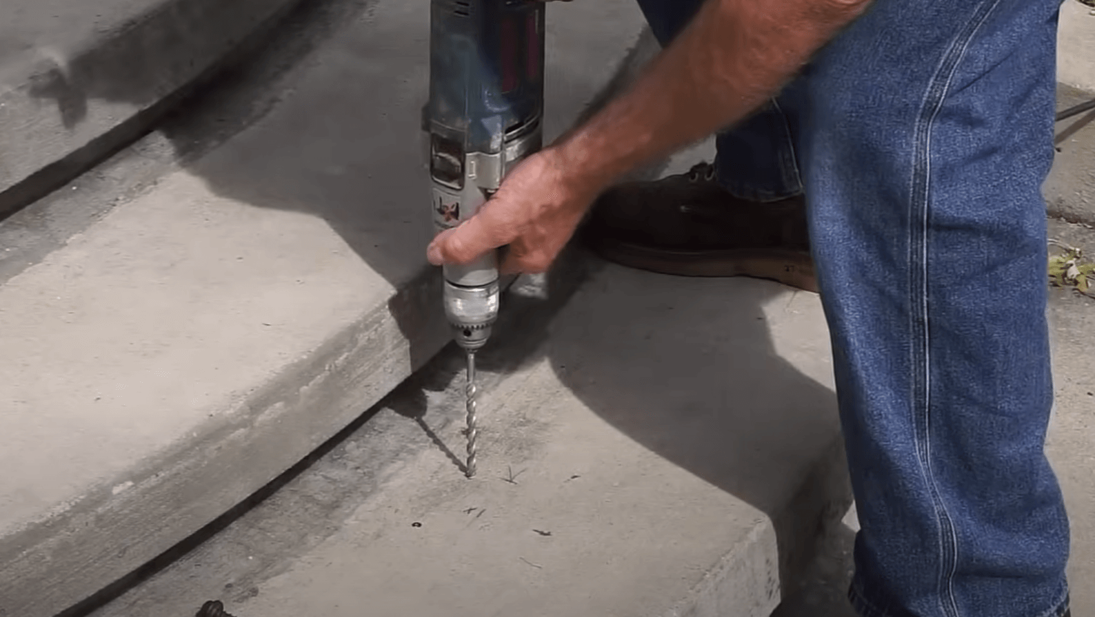 pouring cement to a new concrete porch plus 3 steps in a residential neighborhood in Owsego, IL