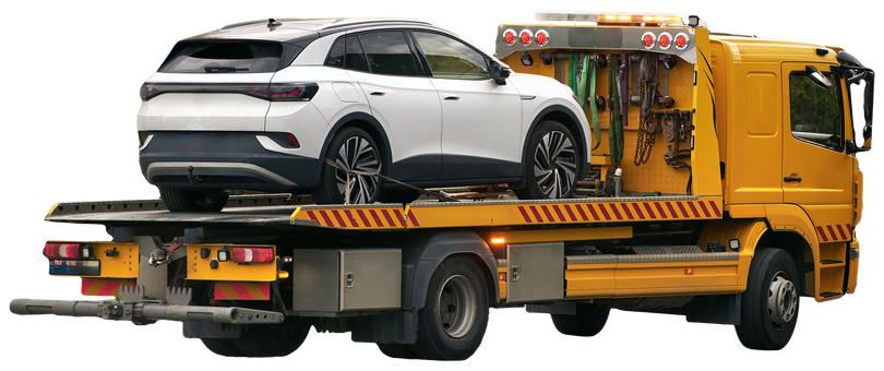 A white car is being towed by a yellow tow truck.