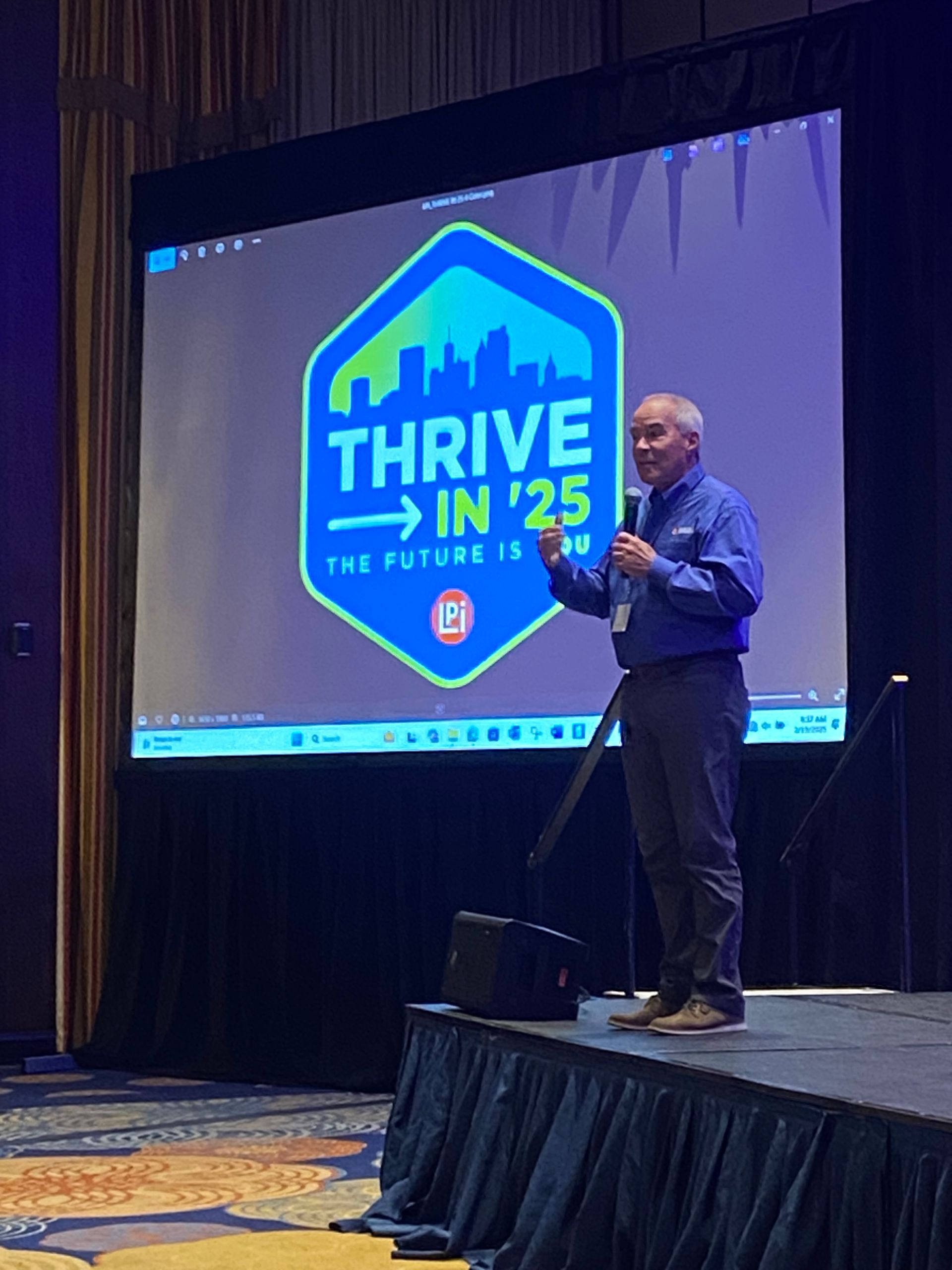 Man presenting on stage