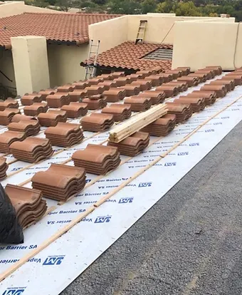 A shingle roof is being installed by Four Peaks Roofing in Cape Coral