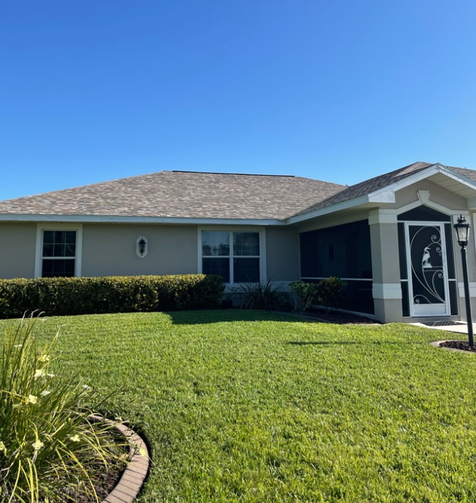 A house with a new tile roof installed by Four Peaks Roofing in Cape Coral