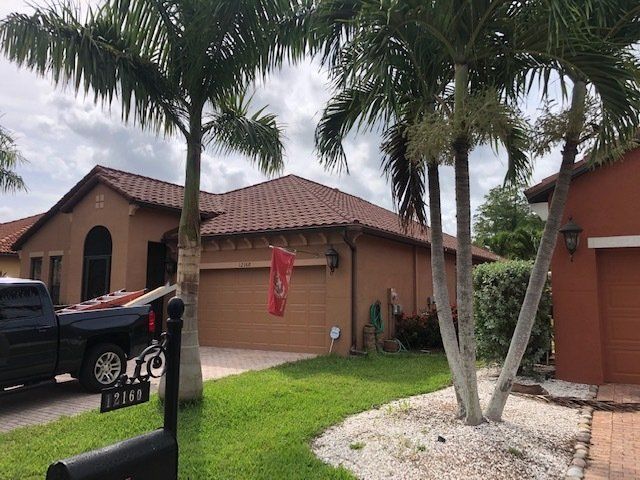Homes with new roofs installed by Four Peaks Roofing in Bonita Springs
