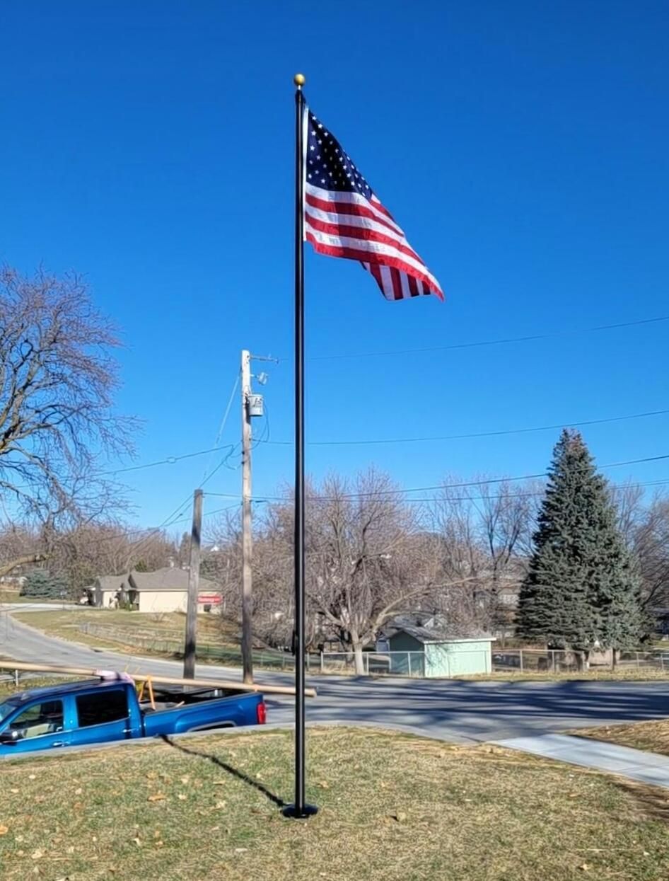 Flag on Pole in Blue Sky — Omaha, NE — A -1 Flags, Poles, and Repair