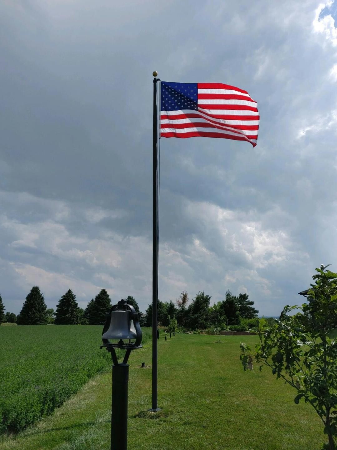 25 Black Flag Pole With Green Fields — Omaha, NE — A -1 Flags, Poles, and Repair
