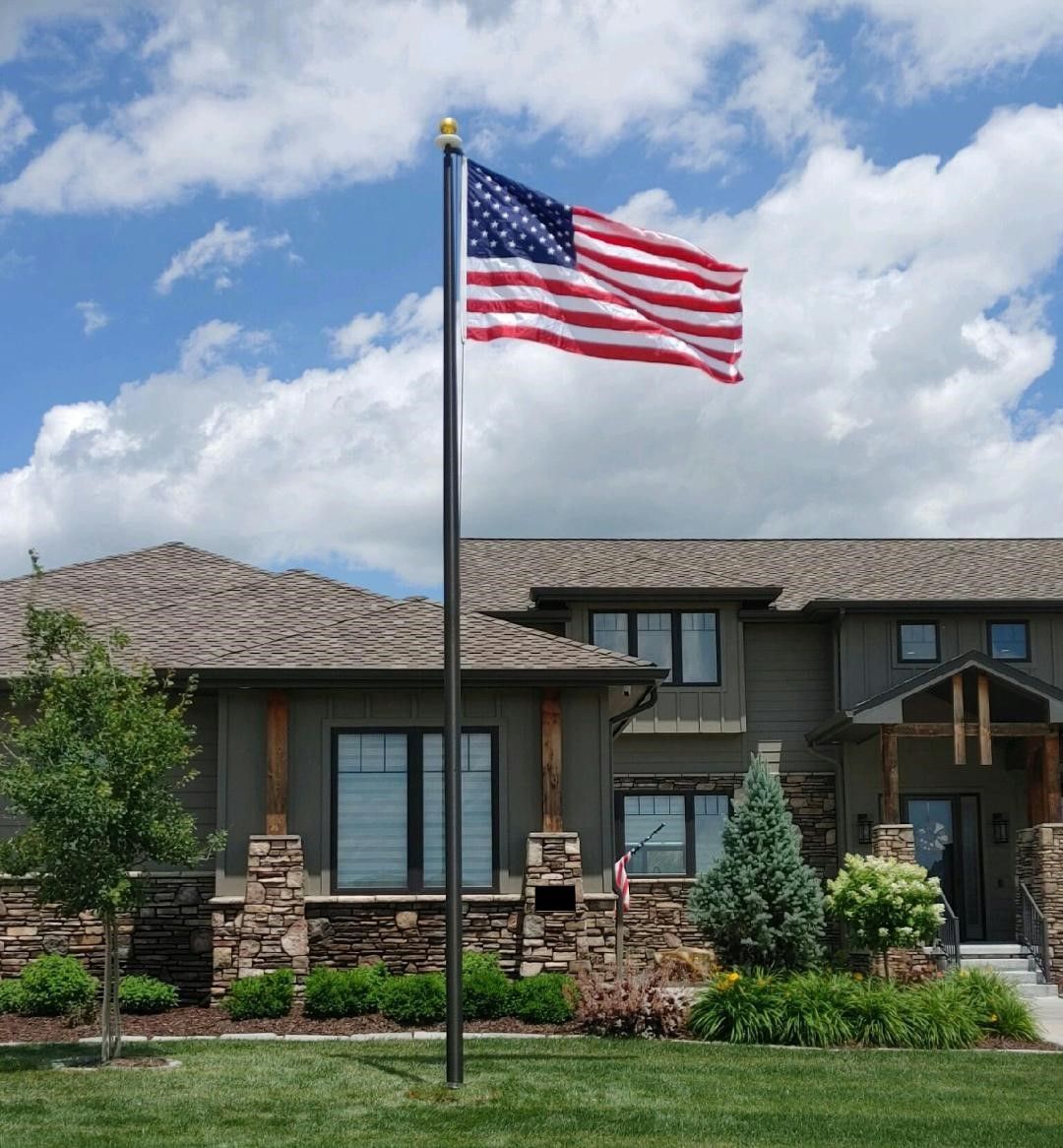 25 Bronze Flag Pole With Elegant House And Flags — Omaha, NE — A -1 Flags, Poles, and Repair
