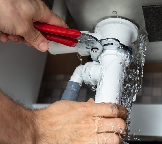 Fixing the Sink Pipe — Elkhart, IN — Eby Plumbing Plus Inc