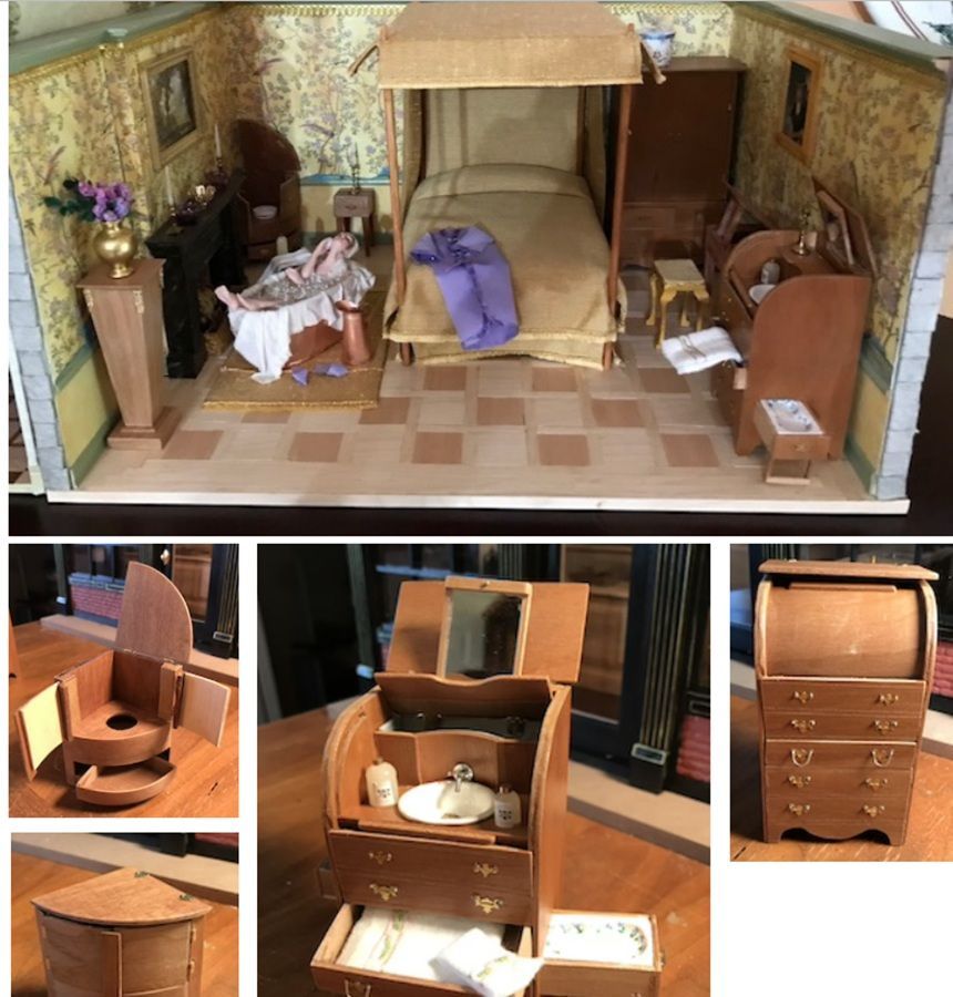 Miniature dollhouse bedroom with canopy bed, vanity, chair, and matching furniture set