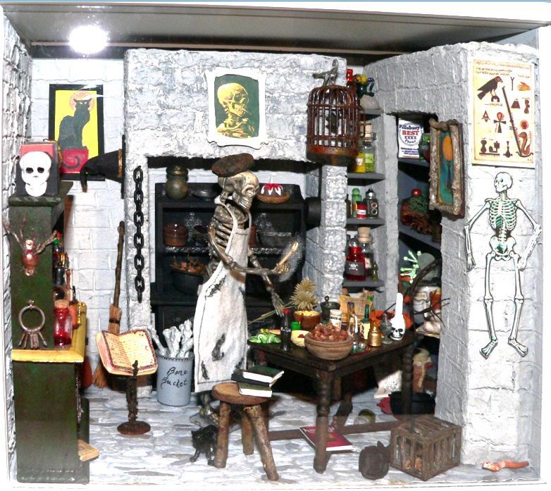 Skull-themed Halloween room with skeleton figure, candles, bottles, and spooky wall decorations
