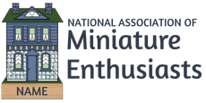 Logo for National Association of Miniature Enthusiasts with a small house and nameplate