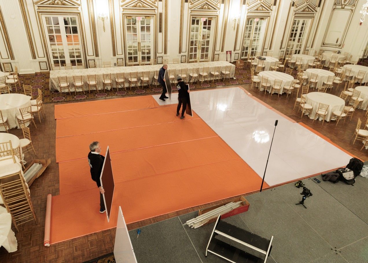 Large Function Room at The Hyannis Hotel & Conference Center with tables and chairs set up for a banquet.