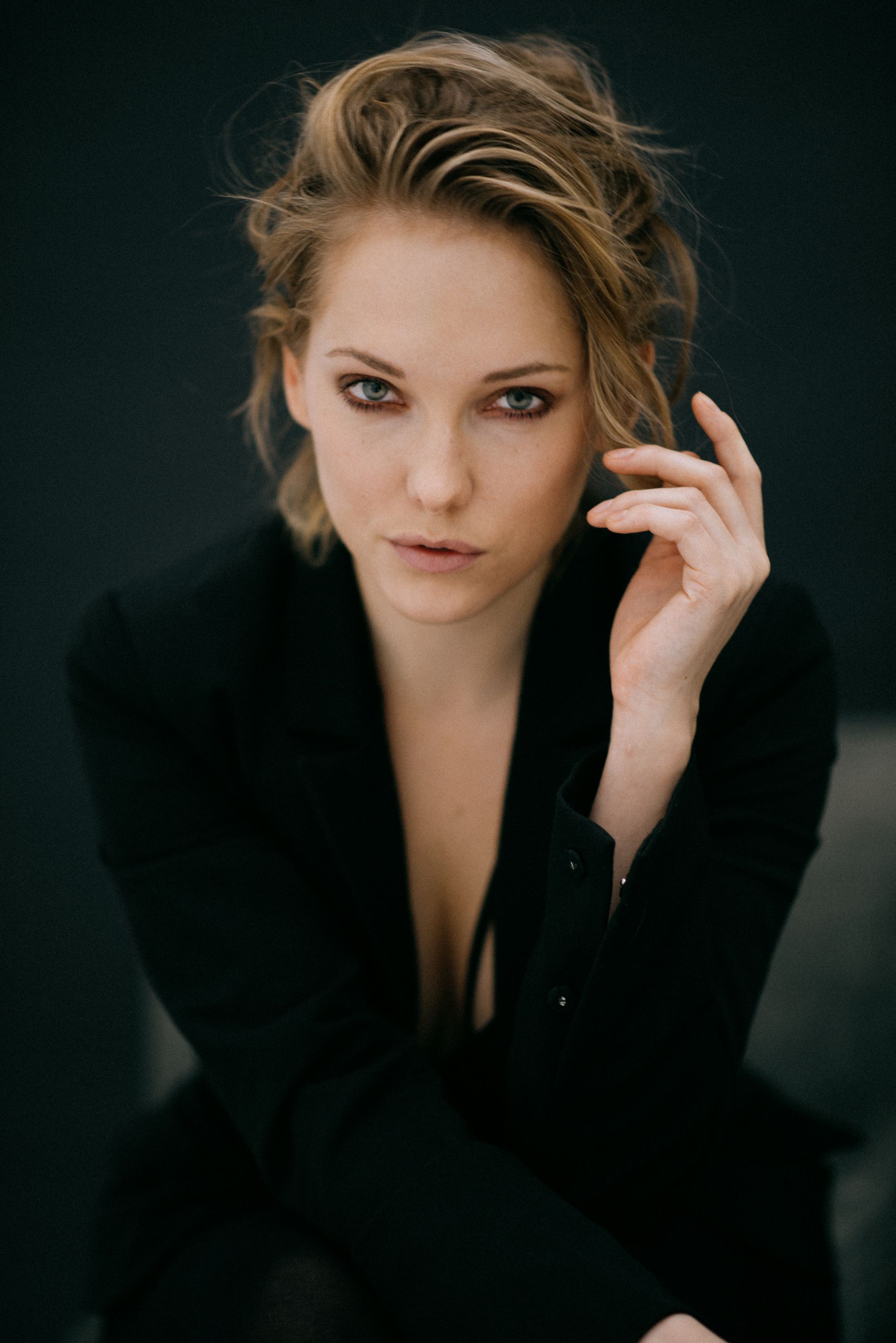 Actress July Janssen in a range of headshots, from natural expressions to varied characters like action heroine, tomboy, femme fatale, commercial friendly, and businesslike